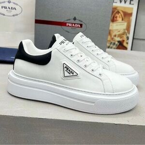 Prada Women's White and Black Sneakers